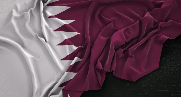 flyinghelpline-qatar-flag-wrinkled-dark-background-3d-render_1379-620